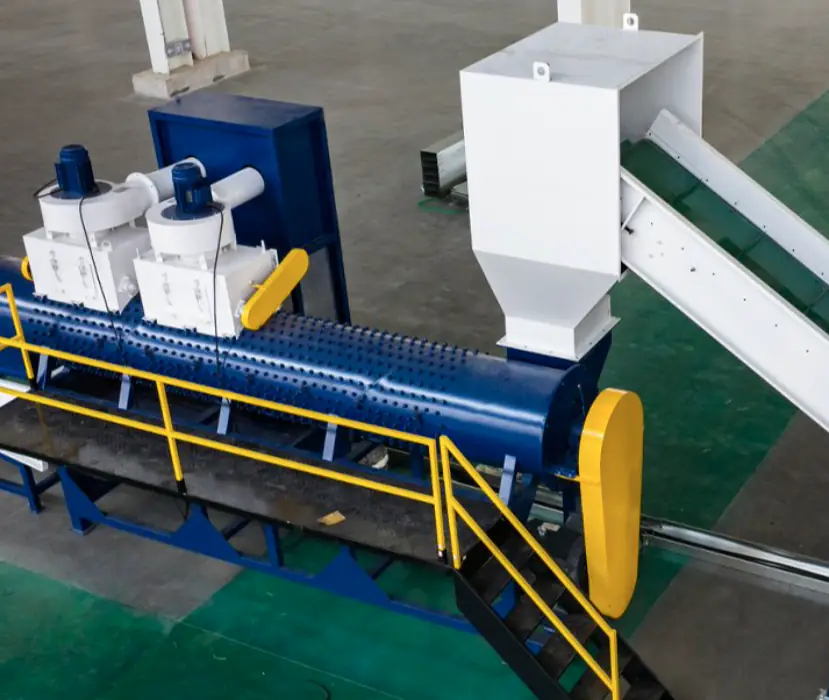 PET bottle label remover machine with a blue scraping drum, twin suction fans on top, feed hopper and inclined conveyors